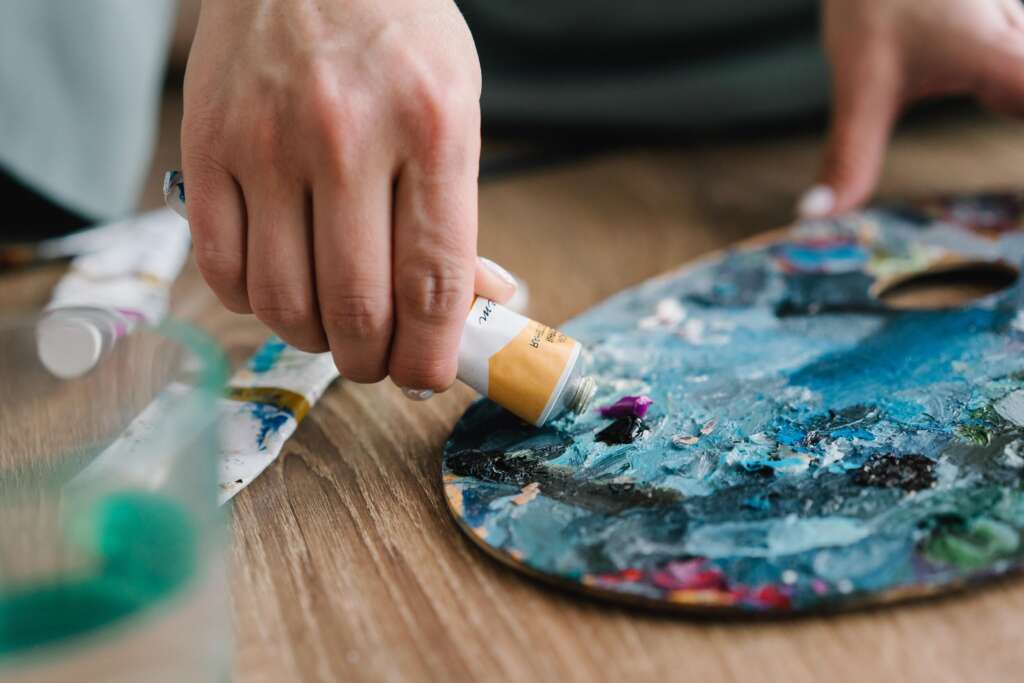 Painting away the blue days.